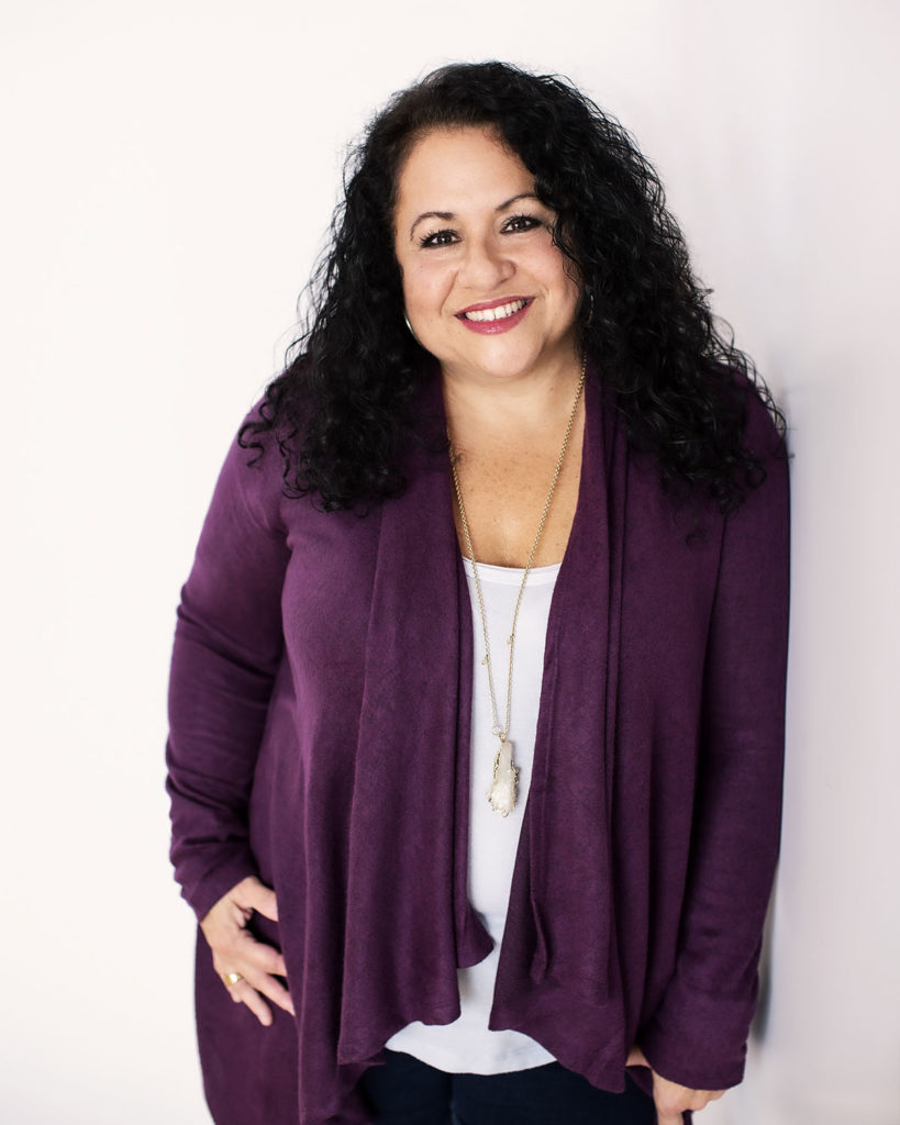 Celebrating Local Women In Business Featuring Pam Patalano headshot in purple sweater